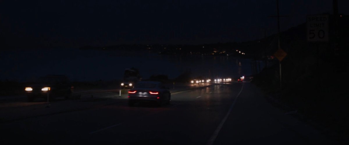 Nighttime shot of cars on Pacific Coast Highway.