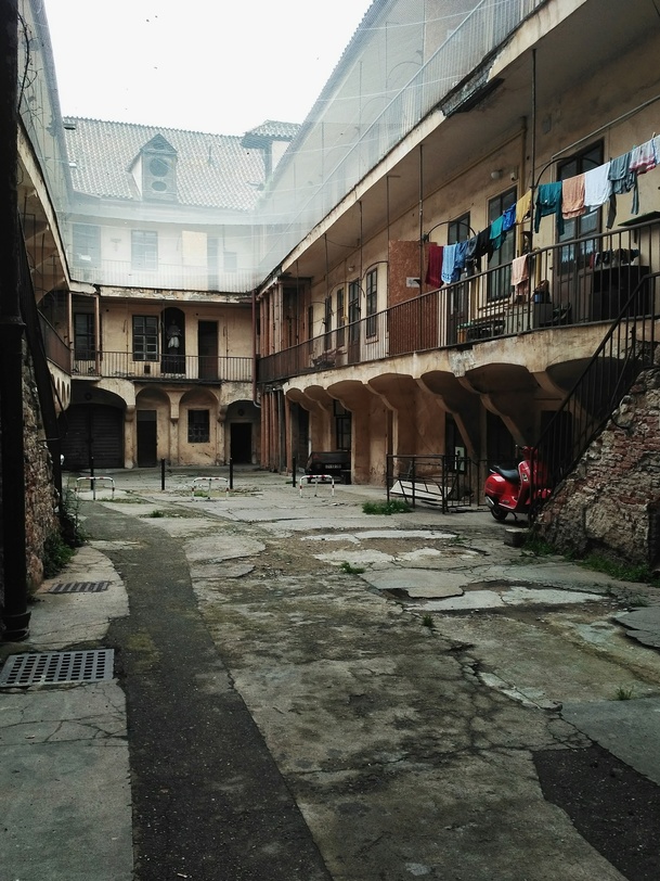 Behind the scenes photo of a courtyard in Prague.